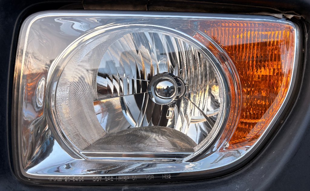 The same headlight crystal clear after restoration