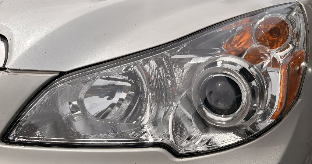 The same headlight crystal clear after restoration