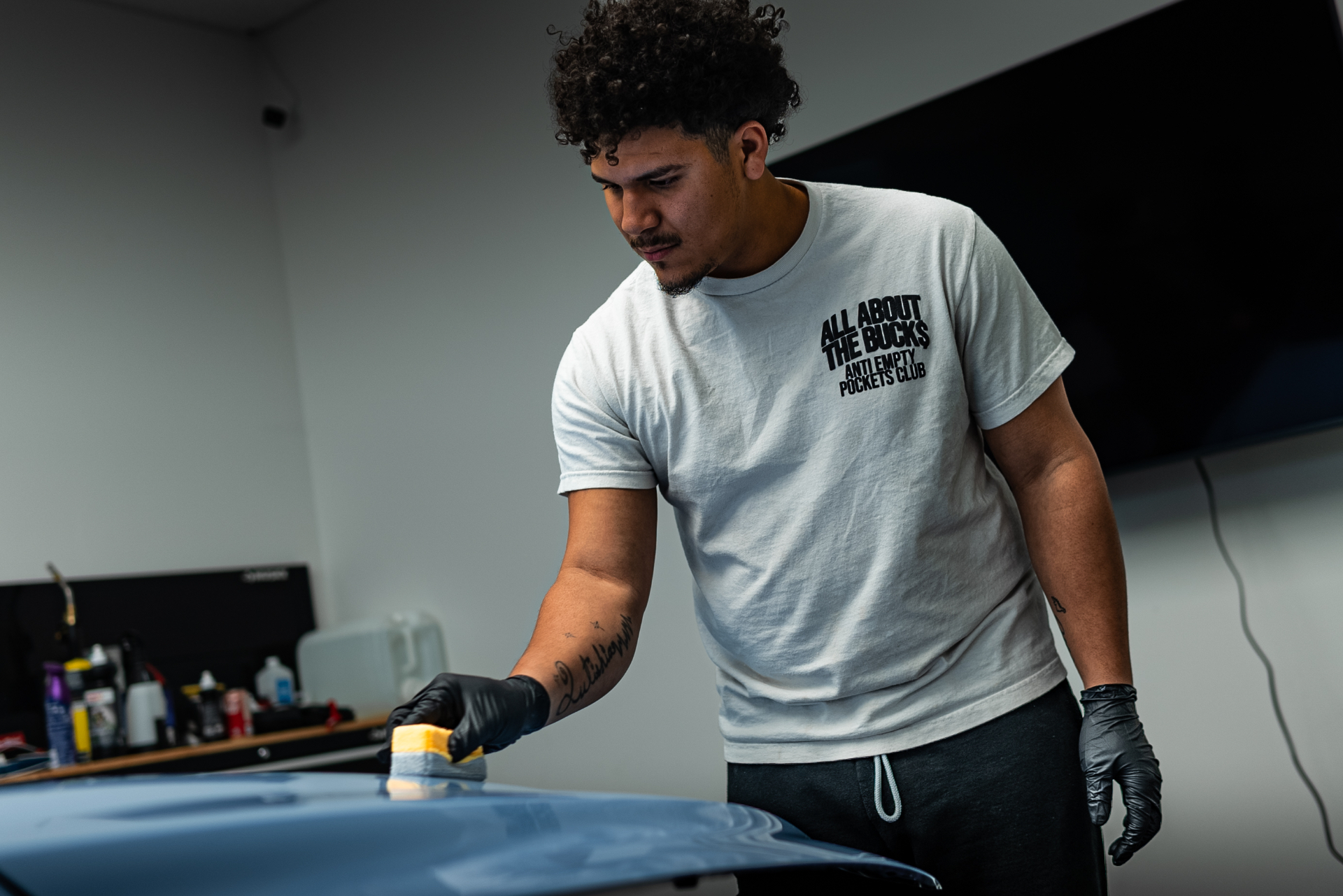 Graphene ceramic coating being applied to a vehicle