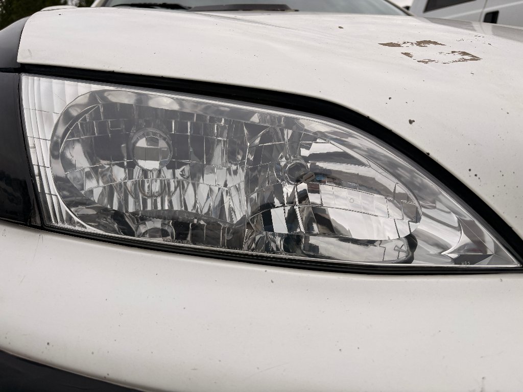 Headlight restored crystal clear after Slums restoration
